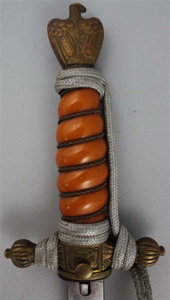 A German WWII Third Reich naval officers dagger, by F.W. Holler Solingen, overall 16.5in.